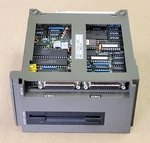 Nec FD1137C Floppy Disk Drive, Mitsubishi MC712B BN624A799G51 Rev Board Used. Price: $300.00.